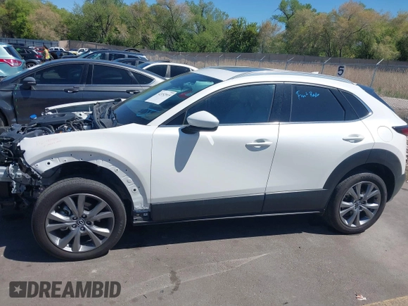 2024 Mazda CX-30 S Premium with VIN 3MVDMBDM8RM633580, listed as a IAAI auction lot 42152915 with 18,679 mi miles and . Bid and sale history available at DreamBid. Image 14.
