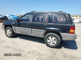 1995 Jeep Grand Cherokee Laredo z VIN 1J4FX58S9SC534442, wystawiony jako Copart lot #61233725 z przebiegiem 363 688 mil mil oraz Szkoda całkowita • Salvage title. Historia ofert i sprzedaży dostępna na DreamBid. Obrazek 2.