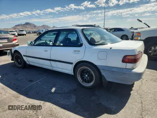 1992 Acura Integra with VIN JH4DB1649NS000455, listed as a Copart auction lot 62386755 with 209,785 mi miles and Salvage title. Bid and sale history available at DreamBid. Image 2.