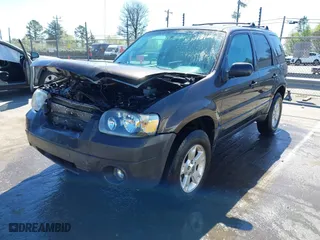 2006 Ford Escape XLT with VIN 1FMCU03116KB57387, listed as a IAAI auction lot 41813041 with 180,417 mi miles. Bid and sale history available at carsss.com. Image 18.