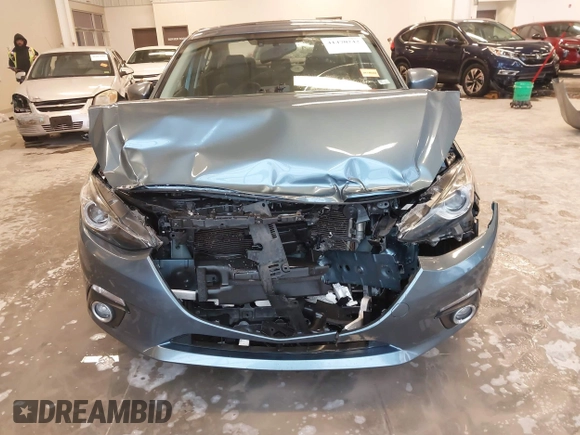 2014 Mazda 3 S Grand Touring with VIN JM1BM1W31E1182703, listed as a IAAI auction lot 41470742 with 123,956 mi miles and . Bid and sale history available at DreamBid. Image 12.
