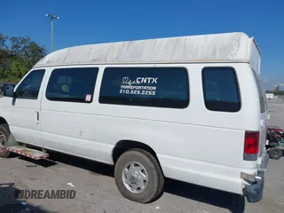 2012 Ford Econoline Cargo Commercial with VIN 1FTNS2EW4CDA50633, listed as a IAAI auction lot 40694015 with 309,334 mi miles. Bid and sale history available at carsss.com. Image 14.