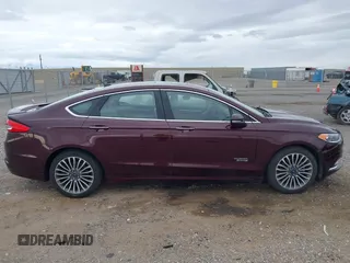 2017 Ford Fusion Titanium with VIN 3FA6P0SU3HR208641, listed as a IAAI auction lot 41732983 with 80,428 mi miles and . Bid and sale history available at DreamBid. Image 13.