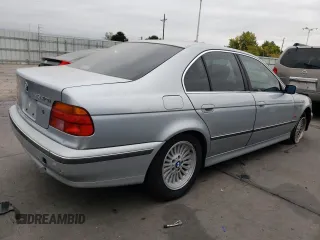 1997 BMW 5 Series 540iA with VIN WBADE6327VBW53064, listed as a Copart auction lot 77033604 with 0 mi miles and Salvage Title. Bid and sale history available at carsss.com. Image 3.