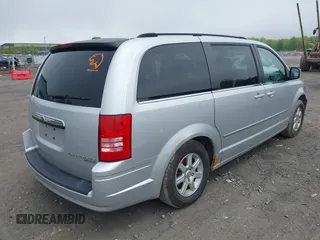 2010 Chrysler Town & Country Touring with VIN 2A4RR5D14AR271397, listed as a IAAI auction lot 42181231 with 200,547 mi miles and . Bid and sale history available at DreamBid. Image 4.