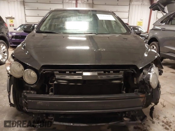 2015 Chevrolet Sonic LT with VIN 1G1JC5SH4F4163515, listed as a IAAI auction lot 41962147 with 133,104 mi miles and . Bid and sale history available at DreamBid. Image 6.