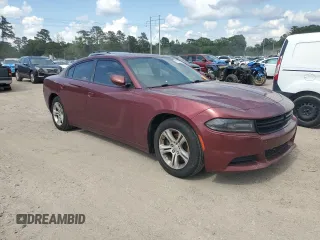 2019 Dodge Charger SXT with VIN 2C3CDXBG4KH721185, listed as a Copart auction lot 57872325 with 123,429 mi miles and Salvage title. Bid and sale history available at DreamBid. Image 4.