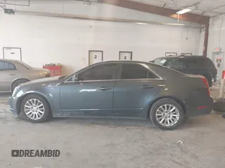 2010 Cadillac CTS Luxury with VIN 1G6DG5EG3A0146283, listed as a IAAI auction lot 42590369 with 219,961 mi miles and . Bid and sale history available at DreamBid. Image 14.