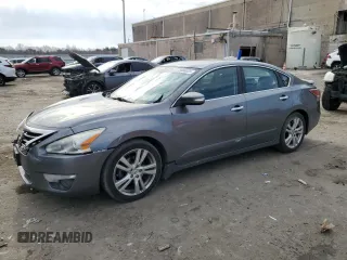 2015 Nissan Altima S z VIN 1N4BL3AP9FC296579, wystawiony jako Copart lot #49984025 z przebiegiem 163 645 mil mil oraz Czysty tytuł • Clean title. Historia ofert i sprzedaży dostępna na DreamBid. Obrazek 1.
