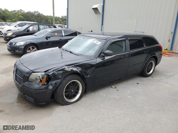 2005 Dodge Magnum SE with VIN 2D4FV48V65H510653, listed as a Copart auction lot 70927144 with 105,350 mi miles and Salvage Title. Bid and sale history available at carsss.com. Image 1.