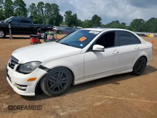 2014 Mercedes-Benz C 250 Sport with VIN WDDGF4HB1EA936517, listed as a Copart auction lot 61046225 with 132,668 mi miles and Salvage title. Bid and sale history available at DreamBid. Image 1.