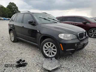 2012 BMW X5 35i with VIN 5UXZV4C59CL763577, listed as a Copart auction lot 62496155 with 148,240 mi miles and Clean title. Bid and sale history available at DreamBid. Image 4.