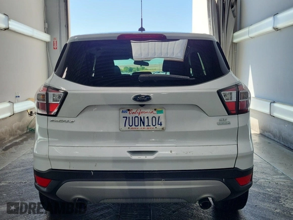2017 Ford Escape SE z VIN 1FMCU0GD4HUB05330, wystawiony jako IAAI lot #42396863 z przebiegiem 66 420 mil mil oraz . Historia ofert i sprzedaży dostępna na DreamBid. Obrazek 21.