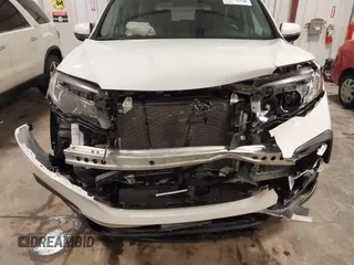 2022 Honda Pilot Special Edition with VIN 5FNYF6H27NB105041, listed as a IAAI auction lot 41916708 with 15,848 mi miles and . Bid and sale history available at DreamBid. Image 6.