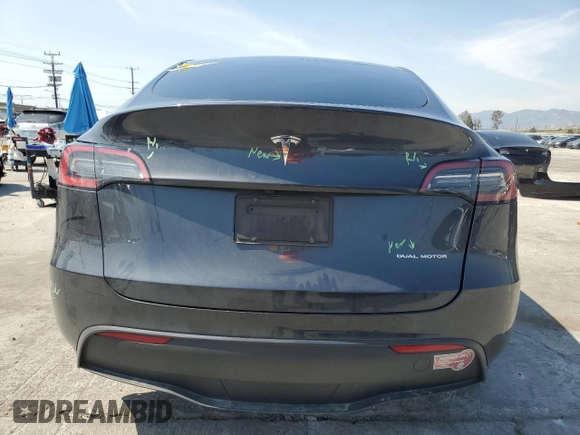 2024 Tesla Model Y Long Range z VIN 7SAYGDEE0RF024326, wystawiony jako Copart lot #52149675 z przebiegiem 34 503 mil mil oraz Szkoda całkowita • Salvage title. Historia ofert i sprzedaży dostępna na DreamBid. Obrazek 6.