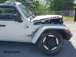 2020 Jeep Wrangler Unlimited Rubicon z VIN 1C4JJXFM5LW278740, wystawiony jako IAAI lot #42086112 z przebiegiem 93 658 mil mil oraz . Historia ofert i sprzedaży dostępna na DreamBid. Obrazek 15.