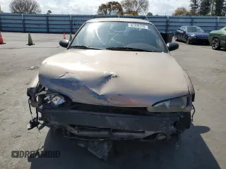 1997 Geo Prizm LSi z VIN 1Y1SK5263VZ408119, wystawiony jako Copart lot #52308235 z przebiegiem 344 971 mil mil oraz Szkody całkowita. Historia ofert i sprzedaży dostępna na DreamBid. Obrazek 5.