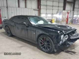 2022 Dodge Challenger R/T Scat Pack z VIN 2C3CDZFJ3NH113213, wystawiony jako IAAI lot #41377401 z przebiegiem 37 148 mil mil oraz . Historia ofert i sprzedaży dostępna na DreamBid. Obrazek 1.