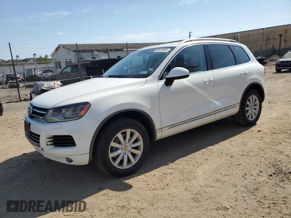 2012 Volkswagen Touareg Sport with VIN WVGEF9BP3CD011165, listed as a Copart auction lot 48913935 with 118,839 mi miles and Salvage Title. Bid and sale history available at DreamBid. Image 1.