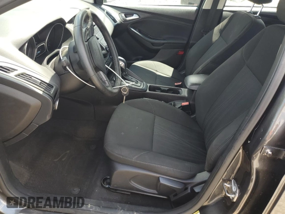 2016 Ford Focus SE with VIN 1FADP3F29GL233719, listed as a Copart auction lot 56857705 with 140,785 mi miles and Salvage title. Bid and sale history available at DreamBid. Image 7.