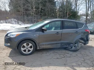 2015 Ford Escape SE with VIN 1FMCU0GXXFUB99852, listed as a IAAI auction lot 41704198 with 84,735 mi miles. Bid and sale history available at carsss.com. Image 14.