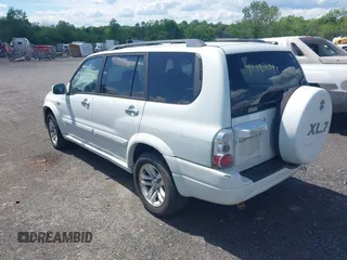 2004 Suzuki XL7 LX z VIN JS3TX92V344103015, wystawiony jako IAAI lot #42187592 z przebiegiem 161 614 mil mil oraz . Historia ofert i sprzedaży dostępna na DreamBid. Obrazek 3.