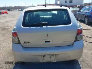 2009 Pontiac Vibe with VIN 5Y2SM67049Z409441, listed as a IAAI auction lot 41873091 with 145,169 mi miles. Bid and sale history available at carsss.com. Image 16.
