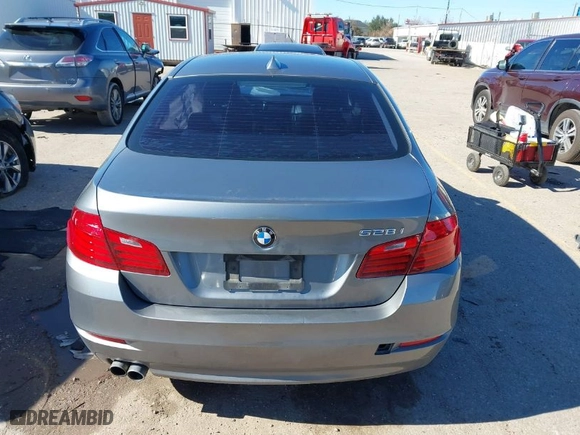 2014 BMW 5 Series 528i with VIN WBA5A5C58ED506079, listed as a IAAI auction lot 41236765 with 157,283 mi miles. Bid and sale history available at carsss.com. Image 16.