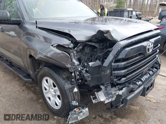2023 Toyota Tundra with VIN 5TFKB5GDXPX002218, listed as a IAAI auction lot 41932719 with 71,335 mi miles and . Bid and sale history available at DreamBid. Image 6.