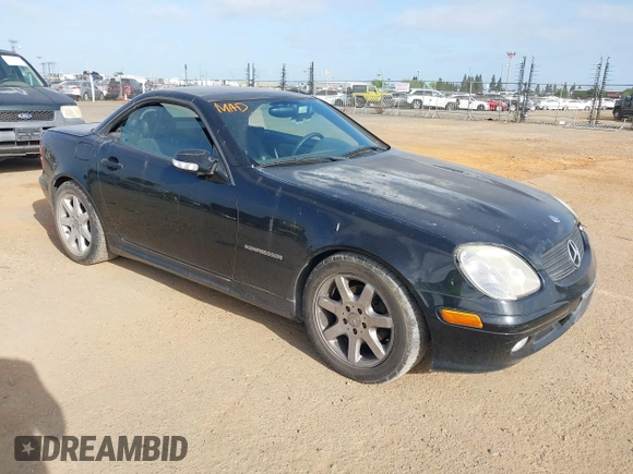 2003 Mercedes-Benz SLK-Class 2.3L with VIN WDBKK49F33F273872, listed as a IAAI auction lot 42111682 with 143,969 mi miles. Bid and sale history available at carsss.com. Image 1.