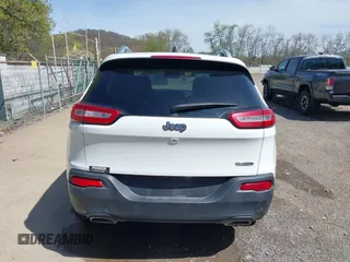 2015 Jeep Cherokee Latitude with VIN 1C4PJLCS3FW670254, listed as a IAAI auction lot 42060659 with 164,291 mi miles. Bid and sale history available at carsss.com. Image 17.