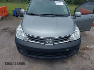 2012 Nissan Versa S with VIN 3N1BC1CP9CK239898, listed as a IAAI auction lot 42210704 with 97,714 mi miles and . Bid and sale history available at DreamBid. Image 6.