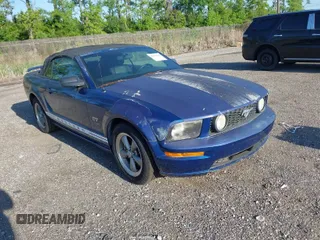 2006 Ford Mustang GT Deluxe with VIN 1ZVFT85H465215338, listed as a IAAI auction lot 42035867 with 124,381 mi miles. Bid and sale history available at carsss.com. Image 1.