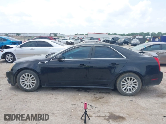 2012 Cadillac CTS with VIN 1G6DA5E55C0156946, listed as a IAAI auction lot 42244345 with 106,189 mi miles and . Bid and sale history available at DreamBid. Image 14.