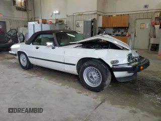 1989 Jaguar XJS z VIN SAJNV4847KC151989, wystawiony jako Copart lot #61401054 z przebiegiem 80 570 mil mil oraz Szkody całkowita. Historia ofert i sprzedaży dostępna na DreamBid. Obrazek 4.