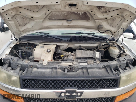 2005 Chevrolet Express Passenger with VIN 1GAHG39U051232615, listed as a Copart auction lot 73574264 with 207,303 mi miles and Salvage title. Bid and sale history available at DreamBid. Image 12.