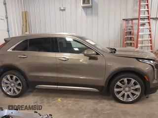 2020 Cadillac XT4 AWD Premium Luxury with VIN 1GYFZDR44LF068018, listed as a IAAI auction lot 41990967 with 11,800 mi miles and . Bid and sale history available at DreamBid. Image 13.