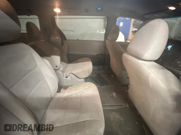 2015 Toyota Sienna L with VIN 5TDZK3DC5FS623224, listed as a Copart auction lot 54958485 with 82,419 mi miles and Salvage Title. Bid and sale history available at carsss.com. Image 6.