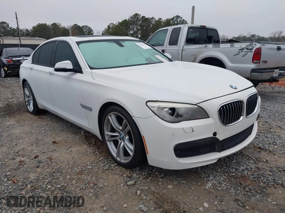 2014 BMW 7 Series 740i with VIN WBAYA6C51ED144387, listed as a IAAI auction lot 41226638 with 161,448 mi miles. Bid and sale history available at carsss.com. Image 1.