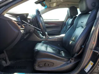 2014 Cadillac CTS AWD with VIN 1G6AW5SX2E0141060, listed as a Copart auction lot 57281445 with 137,904 mi miles and Salvage title. Bid and sale history available at DreamBid. Image 7.