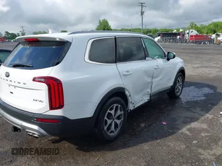 2020 Kia Telluride EX z VIN 5XYP3DHC0LG048043, wystawiony jako IAAI lot #42259706 z przebiegiem 55 363 mil mil oraz . Historia ofert i sprzedaży dostępna na DreamBid. Obrazek 4.