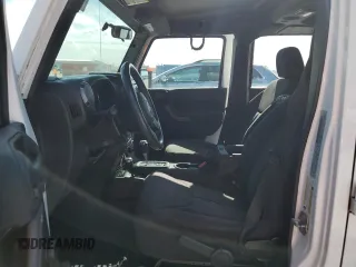2018 Jeep Wrangler JK Unlimited Sport S with VIN 1C4BJWDG6JL811267, listed as a Copart auction lot 86688384 with 60,882 mi miles and Non Repairable. Bid and sale history available at carsss.com. Image 7.
