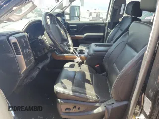 2017 Chevrolet Silverado 3500HD High Country with VIN 1GC4K1EY7HF212936, listed as a Copart auction lot 52511925 with 201,569 mi miles and Salvage Title. Bid and sale history available at DreamBid. Image 7.