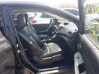 2014 Honda CR-V EX-L with VIN 2HKRM4H76EH673891, listed as a IAAI auction lot 42009693 with 103,798 mi miles. Bid and sale history available at carsss.com. Image 5.