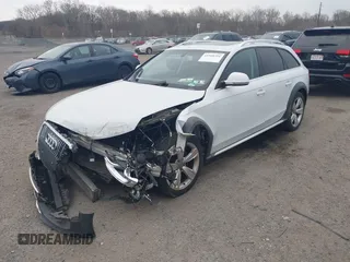 2016 Audi allroad Premium Plus with VIN WA1UFAFL5GA010559, listed as a IAAI auction lot 41918324 with 138,499 mi miles. Bid and sale history available at carsss.com. Image 2.