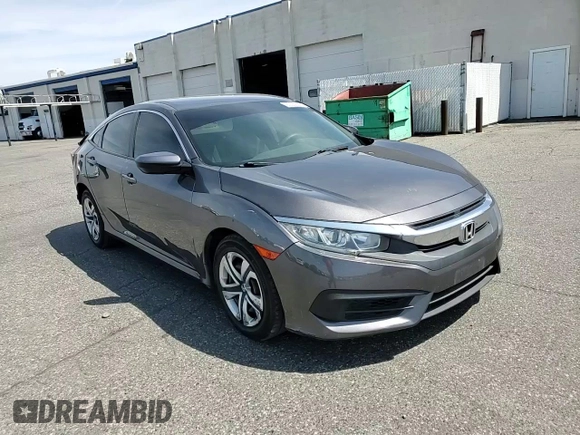 2017 Honda Civic LX with VIN 2HGFC2F5XHH539976, listed as a Copart auction lot 60558865 with 79,519 mi miles and Salvage title. Bid and sale history available at DreamBid. Image 14.