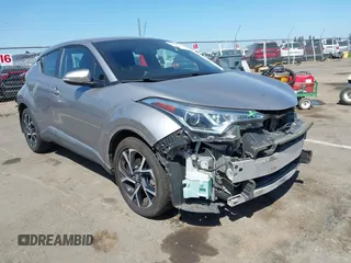 2018 Toyota C-HR XLE z VIN NMTKHMBX1JR005594, wystawiony jako IAAI lot #42033896 z przebiegiem 76 600 mil mil oraz . Historia ofert i sprzedaży dostępna na DreamBid. Obrazek 1.