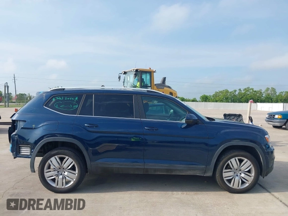 2019 Volkswagen Atlas SE with VIN 1V2WR2CA8KC618988, listed as a IAAI auction lot 42212845 with 60,481 mi miles and . Bid and sale history available at DreamBid. Image 13.