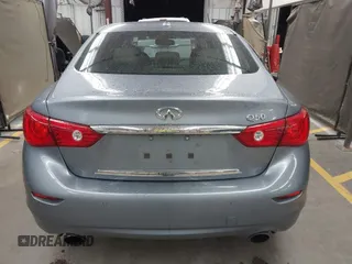 2015 Infiniti Q50 Premium z VIN JN1BV7AP6FM337369, wystawiony jako IAAI lot #41788419 z przebiegiem 106 977 mil mil oraz . Historia ofert i sprzedaży dostępna na DreamBid. Obrazek 16.
