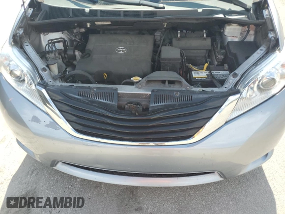 2012 Toyota Sienna LE AAS z VIN 5TDKK3DC7CS238373, wystawiony jako Copart lot #61186245 z przebiegiem 200 950 mil mil oraz Szkoda całkowita • Salvage title. Historia ofert i sprzedaży dostępna na DreamBid. Obrazek 12.